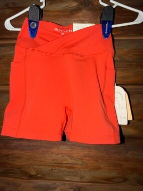 Women’s Blogilates Size XS Crisscross Scrunch Bike shorts- Spicy Orange